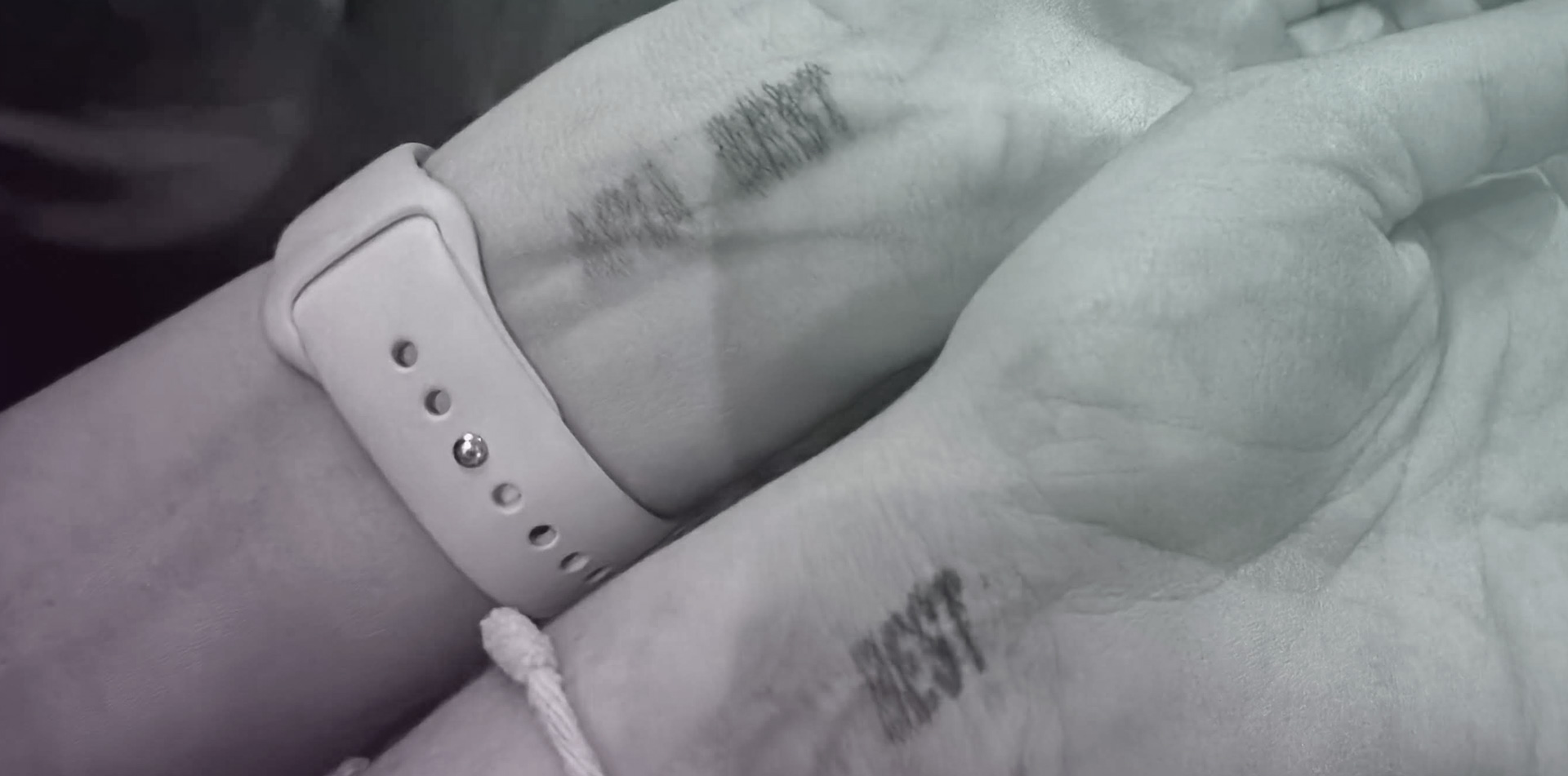 Picture of a stamp on wrist with written best